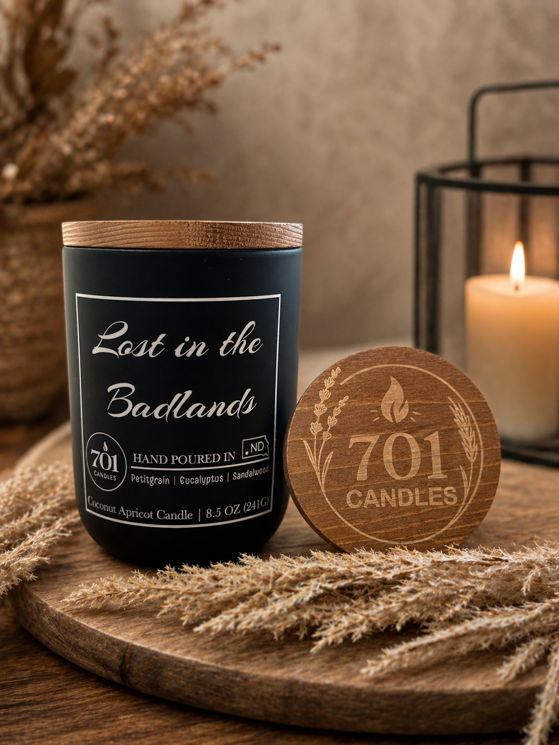 Lost in the Badlands hand-poured coconut apricot candle in matte black tumbler with wooden lid