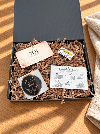 The Double Pour box with its candle care and 701 Candles cards