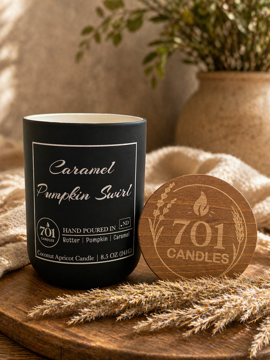 Caramel Pumpkin Swirl hand-poured coconut apricot candle in matte black tumbler with wooden lid