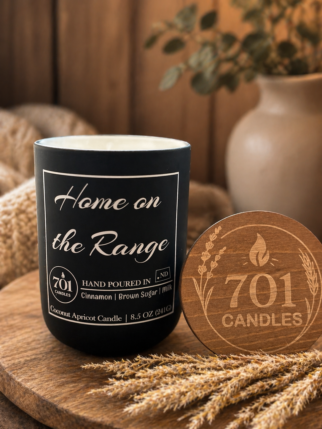 Home on the Range hand-poured coconut apricot candle in matte black tumbler with wooden lid