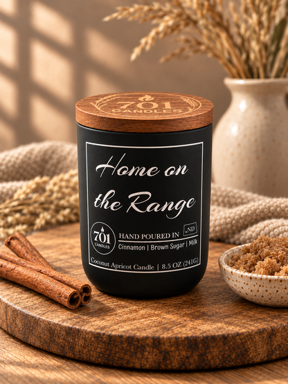 Home on the Range candle in a matte-black ceramic vessel with an engraved wooden lid.